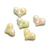 Venta al por mayor Cuentas Perforadas de Corazón de Color Sólido Chapadas en UV Tridimensionales Materiales para Accesorios de Joyería Pulsera Hecha a Mano DIY