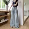 Nuevos jeans de mujer de otoño de pierna recta ancha, de tiro alto, adelgazantes, de longitud hasta el suelo, rasgados, estilo retro americano