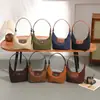 Bolsa Multifuncional Retro de Mano para Empanadillas Transfronteriza Nuevo Estilo Elegante Bolso Cruzado Retro Simple Exquisito Bolso de Hombro Único para Debajo del Brazo