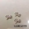 Arte de Uñas Transfronterizo Ultra Brillante Circonita Lazo Plateado Decoración de Uñas Celebridad de Internet Popular Venta Caliente Mariposa Pequeña Accesorios para Uñas Al por Mayor