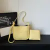 Bolso cruzado casual de diseño de nicho de moda transfronterizo, patrón simple de lichi, bolso de alta gama para madre e hija para ir al trabajo, bolso cruzado versátil