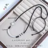 Pulsera y collar de tubo curvo de cien bendiciones con baño de plata arena sobre cobre de alta retención de color, joyería de cuerda negra tejida a mano de estilo chino de alta gama