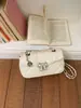 Diseño de moda de verano, bolso cruzado pequeño cuadrado, estilo 2026, bolso de mujer versátil y moderno, patrón clásico de rombos, nuevo modelo transfronterizo