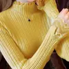 Nueva camisa de base de encaje para mujer, primavera y otoño, cuello medio alto, corte entallado, suéter elegante, suéter de manga larga color albaricoque.