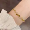 Pulsera de Zirconia con Forma de Hoja de Tirar Versátil de Lujo Ligero Francés Exquisita Moderna Sencilla Tacto de Alta Gama Super Brillante Joyería de Mano al por Mayor