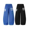 Calça Jogger de Moletom com Barra Assimétrica e Estampa de Letras Estilo Americano para Homens, Marca de Moda High Street Primavera, Estilo Preguiçoso, Calça Casual Wide-Leg Juvenil