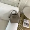 Bolso de Cubo de Mano Simple y Versátil para Mujer, Nueva Moda Primavera 2026, Alta Calidad, Bolso de Hombro y Cruzado de Lujo Ligero