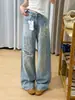 Denim vintage lavado estilo americano con un diseño casual de grafiti salpicado de tinta, con corte de pierna ancha y silueta de pierna recta, una nueva colección de otoño para mujer