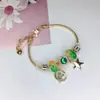 Pulsera Elegante de Aleación Galvanizada con Broche de Langosta y Trébol de Cuatro Hojas para Mujer, Más Vendida en el Sudeste Asiático, Joyería de Dibujos Animados en Stock, Hecha a Mano