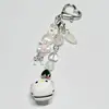 Llavero moderno y fresco con cadena de plata y diseño de viento frío para mujer, con diseño de dibujos animados de amor, bolso creativo, colgante de metal para coche.