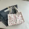 Bolso de lona floral de gran capacidad para mujer, nuevo bolso de hombro tipo momia, bandolera de viaje, otoño 2024