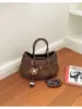 Bolsa de mão de nicho de alta qualidade para mulheres, nova coleção outono 2026, vintage, super popular, para o dia a dia, de ombro e crossbody, bolsa tote