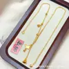 Tienda de Oro Mismo Estilo Collar Dorado Arena con Lazo para Mujer, Versátil y Elegante, Cadena para Clavícula, Joyería de Moda y Exquisita Transmisión en Vivo