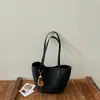 Chegada Nova 2026 Bolsa Tote de Mão com Textura Tecida para Mulheres Design de Nicho Grande Capacidade Estilo Preguiçoso Artístico Bolsa de Ombro