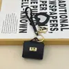 Mini bolsa de presente simples pode guardar fones de ouvido e chaveiros, bolsa de fone de ouvido de cor sólida, pingente de couro, bolsa quadrada criativa, bolsa longa