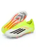 Zapatos de fútbol de alta gama más vendidos en 2026 para ventas transfronterizas con parte superior de fly-knit