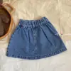 Saia Jeans Versátil com Renda Estilo Coreano Nova Primavera/Verão com Bolso de Renda Saia Jeans Meia-Saia Infantil Jeans Nova 2026