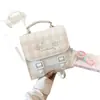 Mochila de Moda para Mujer de Comercio Exterior 2026 Nueva Moda Cuadros Bolso Cruzado de un Solo Hombro Mochila Pequeña Versátil Elegante Venta al por Mayor