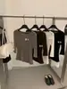 2026 Otoño e Invierno Transfronterizo Nuevo Top de Terciopelo de Gama Alta Cuello Redondo Holgado Suéter de Punto de Lujo Camiseta Base de Terciopelo Dorado
