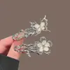 Pinza para el pelo de flecos de alta gama estilo Ins, pinza de pico de pato, moderna y simple, elegante diseño de mariposa y flor, pinza lateral de aleación de plata