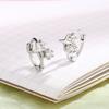 Pendientes con hebilla de estrella y diamante brillante para mujer, estilo dulce y moderno, personalizados, grandes y pequeños, con circonita y estrella de cuatro puntas, con doble cruz.