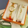Moda Popular de Tendencia Transfronteriza Acero Aleado con Strass Correa de Acero Pulido Pulsera de Disco Pequeño Espejo Cuarzo Reloj para Mujer Venta al por Mayor