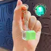 Llavero colgante de Tetris de nueve teclas de moda en colores macaron, accesorio de juguete de botón para aliviar el estrés, venta al por mayor