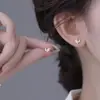 Pendientes de Corazón de Aguja de Plata 999 para Mujer Diseño de Nicho Pendientes de Estrella Exquisitos Pequeños Delicados Sensación de Alta Gama Cuidado del Agujero del Oído Pendiente