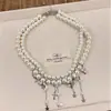 Collar de Perlas Multicapa de Alta Resistencia para Mujer con Colgantes de Cruz, Estrella y Borla, Estilo Lujo Ligero, Sensación de Alta Gama, Cadena para Clavícula para Fiesta Nocturna