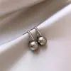 Brincos de metal de pérola cinza Francês retro Coreia do Sul imitação de personalidade Shijia pérola simples temperamento brincos