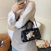Bolsa de Mão de Luxo e Elegante para Mulheres 2025 Nova Tendência Moda Simples Versátil Trabalho Deslocamento Ombro Transversal