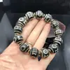 Venta al por mayor del fabricante Pulsera de cuentas Dzi de Xizang 16 mm Negra y Blanca Dzi Weathered B