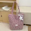 Bolsa feminina de grande capacidade, nova bolsa de ombro versátil da moda outono 2026, versão coreana bolsa tote casual com estrela
