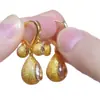 Nuevos Pendientes Clásicos Versátiles de Zirconia Color Café Granate Flor de Loto Tres Vidas Tres Adoraciones para Mujer, Pendientes Versátiles de Moda de Alta Gama