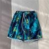 Pantalones de Playa Hawaianos Americanos de Secado Rápido Sueltos para Pareja Cinco Puntos Combinables Pantalones de Flores Pantalones de Moda de Largo Medio Pantalones Cortos Juveniles