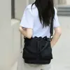 Bolsa de hombro tipo cubo de gran capacidad con cordón, bolsa de almacenamiento para actividades al aire libre, ocio, viajes, bolsa de mensajero ligera y simple para el día a día, venta al por mayor