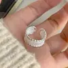 O mesmo deslumbrante anel de zircônia do Xiaohongshu, um design de nicho com alto valor estético, adequado para o dedo indicador, joia versátil
