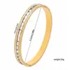 Pulsera popular de acero de titanio con incrustaciones de diamante, estilo nicho europeo y americano INS, tres filas de diamantes, joyería de mano de lujo ligero