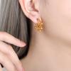 Pendientes de borla de moda francesa de buenos productos transfronterizos acero de titanio oro de 18 quilates bola redonda nicho pendientes exagerados pendientes de temperamento para mujer