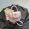 Bolso Nuevo de Primavera 2025 Lindo Bolso Silla Estilo Japonés Galleta Blanco Crema Bolso de Mano Bolso de Hombro Único Cruzado Bolso de Mujer
