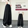 Calça de moletom infantil outono 2026 nova estilo coreano solta para crianças, calça esportiva curva da moda para primavera e outono para crianças mais velhas