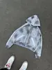 Conjunto de dos piezas de sudadera con capucha y cremallera con estampado de cruz desgastado y pantalones de chándal de pierna ancha, atuendo deportivo casual de calle americano
