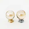 Venta al por mayor de fábrica nuevo mango de cristal color oro champán Tirador para cajón, armario, puerta de gabinete, tirador de puerta, tirador de mueble de un solo agujero
