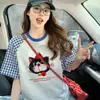 Camiseta holgada de moda con estampado de gato para mujer, popular top casual versátil de bloques de color azul a cuadros con mangas raglán para usar como capa exterior