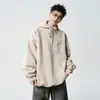 Wukong tiene sudaderas con capucha de peso pesado con bordado de letras de estilo americano moderno, corte holgado y versátiles para parejas, disponibles tanto para hombres como para mujeres
