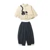 Conjunto de Ropa para Niñas Primavera y Otoño 2026 Nuevo Conjunto de Moda Estilo Coreano para Niñas Pequeñas, Pantalones de Lunares con Gato Negro, Elegante Conjunto de Dos Piezas