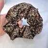 Goma para el pelo retro de estampado de leopardo europea y americana para mujer, accesorio para el pelo de alta gama y elegante para coletas, nuevo estilo de principios de otoño