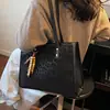 Bolsa Tote Grande Estampa de Leopardo Feminina 2026 Nova Tendência Versátil para o Trabalho Bolsa de Ombro Único Bolsa de Mão de Nicho Feminina