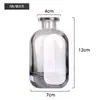 Procesamiento de botella de aroma de vidrio personalizada botella de aroma de vidrio de color degradado pequeño recipiente de fragancia de ratán adornos para dormitorio