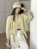 Jaqueta curta estilo commuter com gola alta para mulheres, nova coleção primavera e outono 2026, jaqueta trench coat com retalhos xadrez solta que rejuvenesce para mulheres